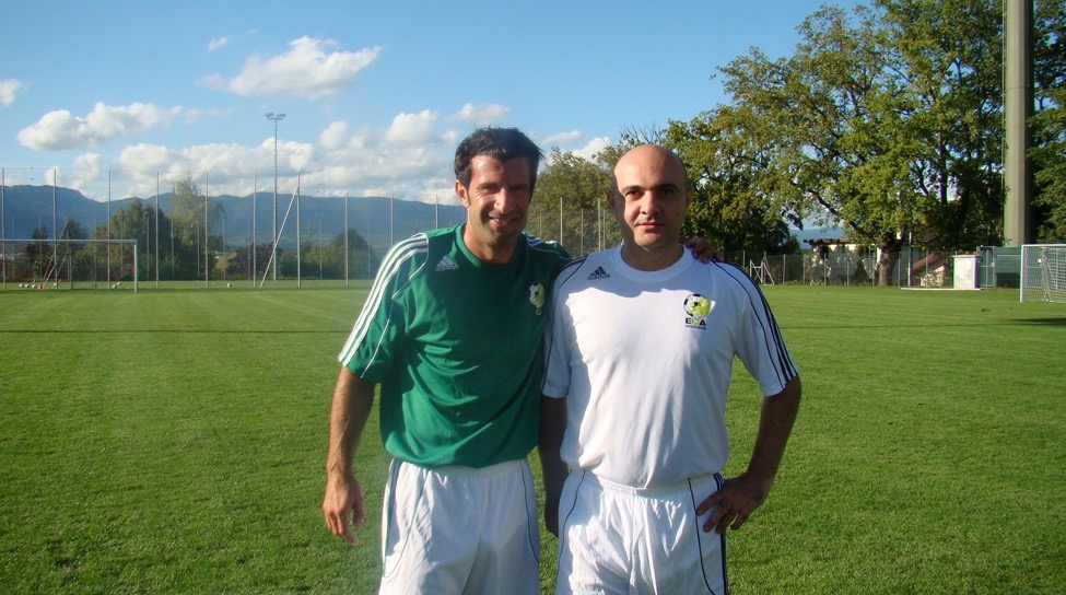 Two football professionals together at a football training ground